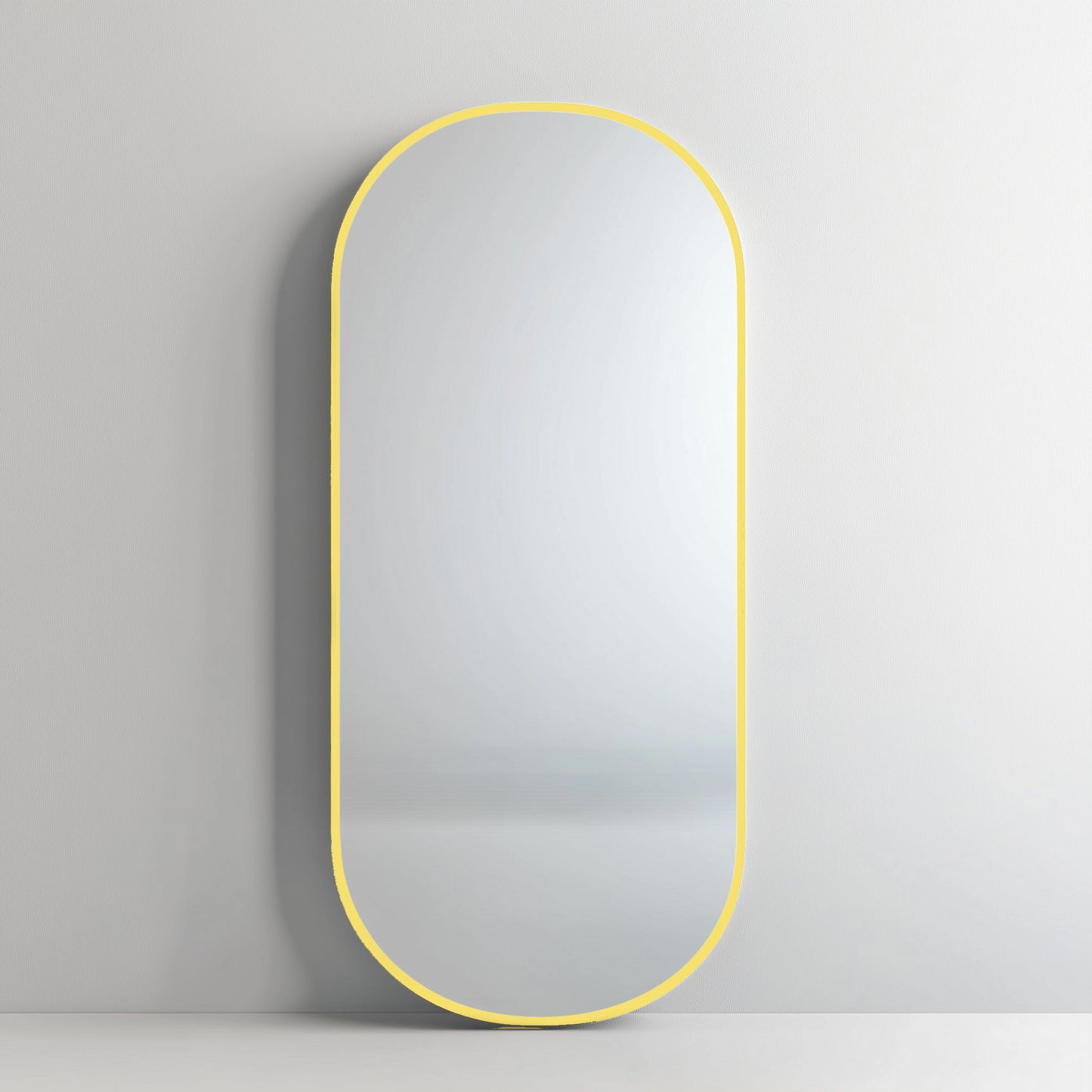 Pill 80 x 45 Duo mirror featuring a yellow aluminium frame, adding a bold, modern pop to minimalist interiors.
