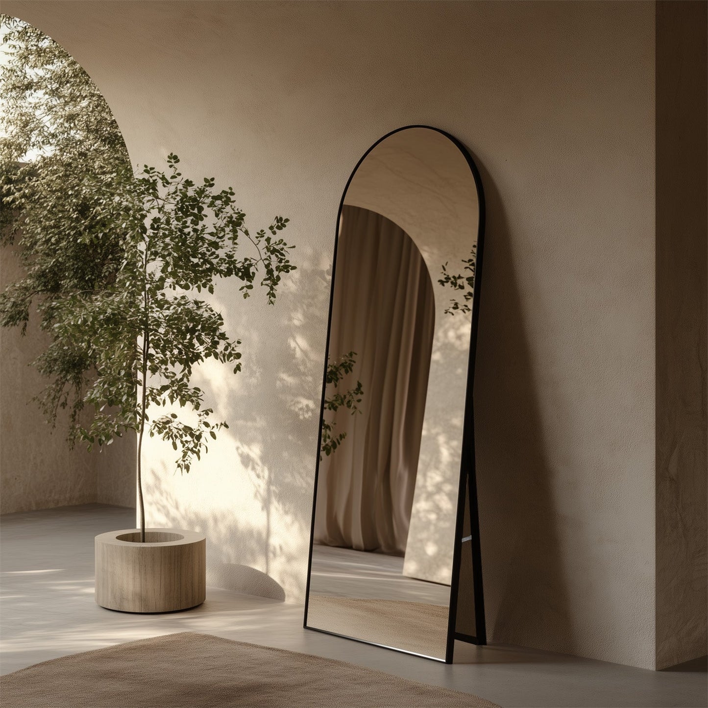Standing Arch Mirror - 160x55cm mirror with minimal black frame, freestanding in a modern neutral-toned room with natural light and indoor plant.