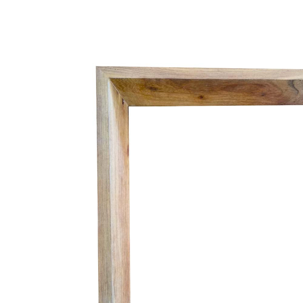 Detail of the 60 x 90 Wooden Kiaat Mirror frame corner, showing precise joinery and the warm tones of genuine Kiaat wood.